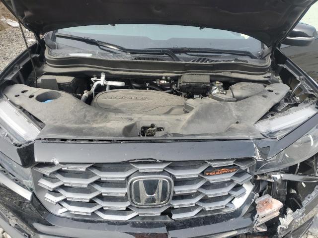 Photo 12 from auction – 2023 HONDA PASSPORT T with VIN 5FNYF8H63PB010963