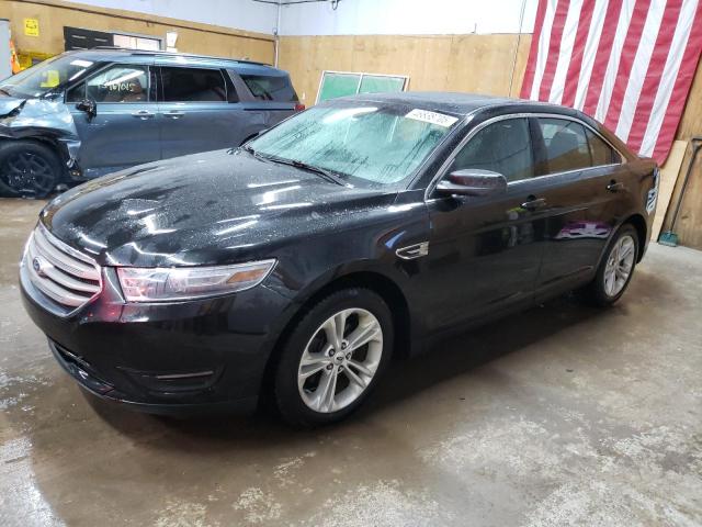 FORD TAURUS SEL 2014 with VIN 1FAHP2H8XEG121370 - Photo from auction
