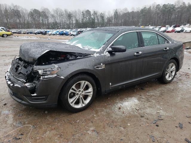 FORD TAURUS SEL 2015 with VIN 1FAHP2E8XFG184569 - Photo from auction
