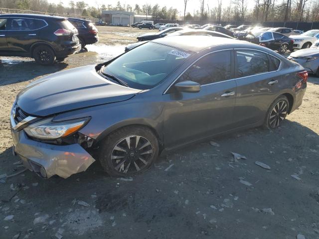 NISSAN ALTIMA 2.5 2018 with VIN 1N4AL3AP2JC255232 - Photo from auction