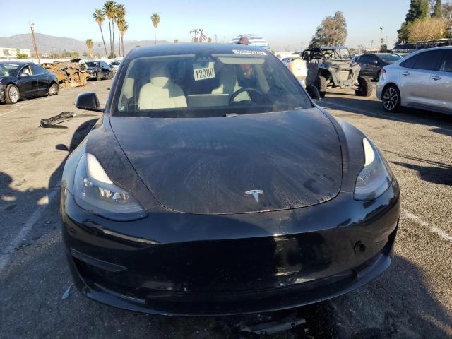 Photo 5 from auction – 2021 TESLA MODEL 3 with VIN 5YJ3E1EA5MF074558