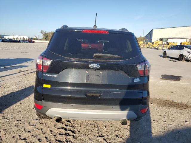 Photo 6 from auction – 2018 FORD ESCAPE SEL with VIN 1FMCU0HDXJUB09791