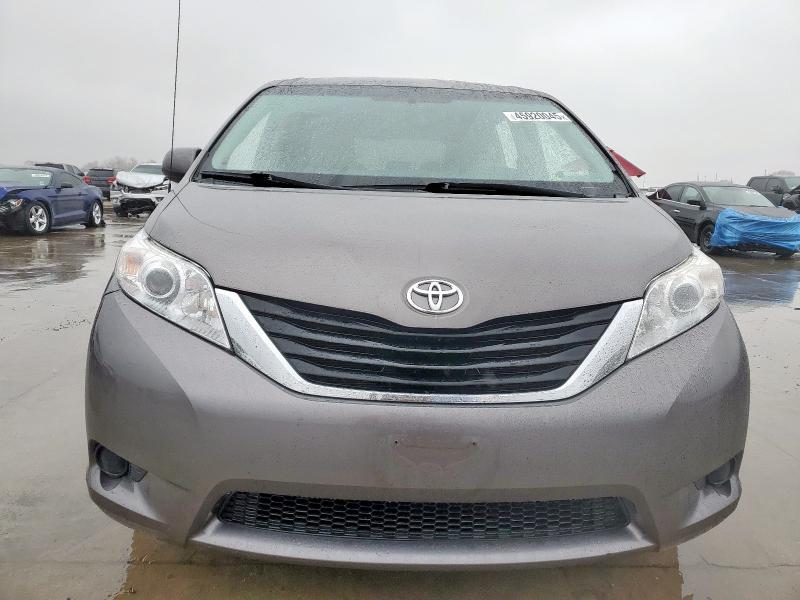 Photo 5 from auction – 2014 TOYOTA SIENNA LE with VIN 5TDKK3DC9ES421728