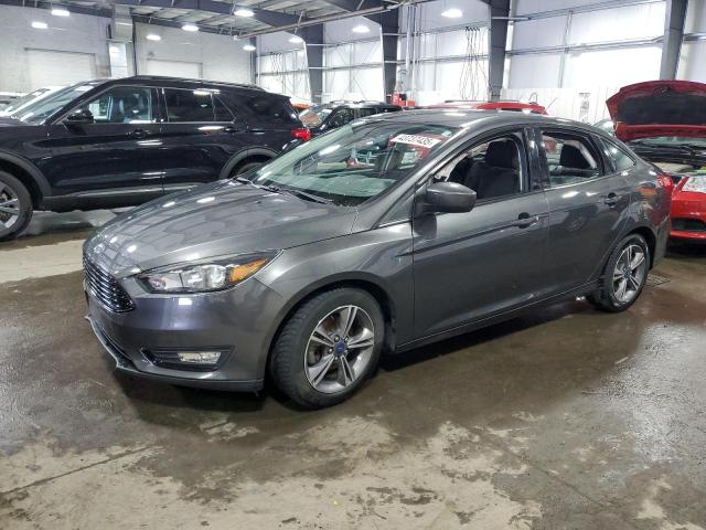 FORD FOCUS SE 2018 with VIN 1FADP3FE5JL244587 - Photo from auction