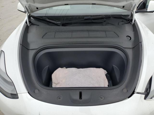 Photo 11 from auction – 2022 TESLA MODEL Y with VIN 7SAYGDEF8NF441910