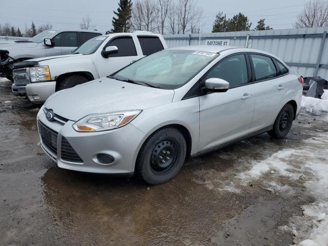 FORD FOCUS SE 2014 with VIN 1FADP3F2XEL273594 - Photo from auction