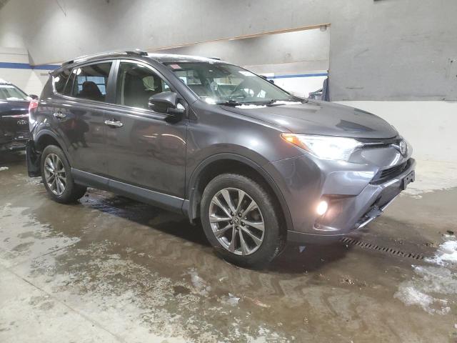 Photo 4 from auction – 2018 TOYOTA RAV4 LIMIT with VIN JTMDFREV8JJ223259