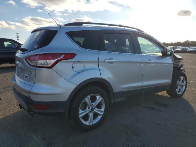 Photo 3 from auction – 2014 FORD ESCAPE SE with VIN 1FMCU9G96EUD90883