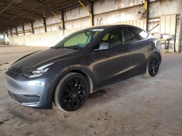 TESLA MODEL Y 2021 with VIN 5YJYGAEE1MF265090 - Photo from auction