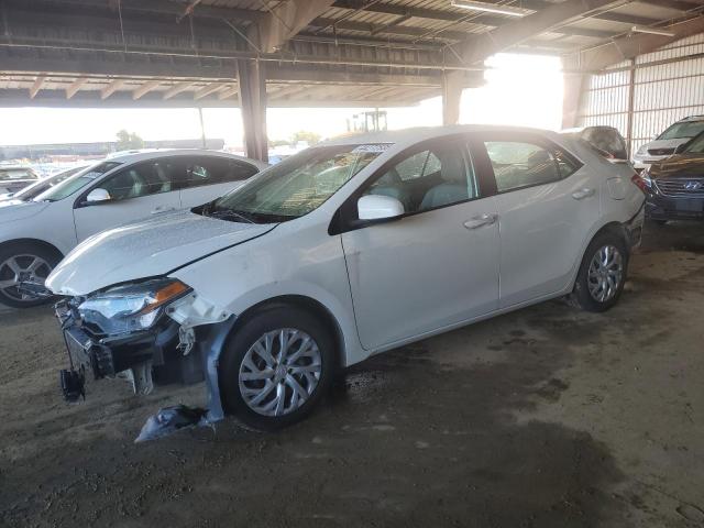 TOYOTA COROLLA L 2018 with VIN 5YFBURHE0JP758025 - Photo from auction