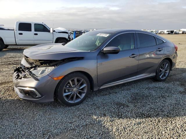 HONDA CIVIC EX 2019 with VIN 19XFC1F37KE213367 - Photo from auction