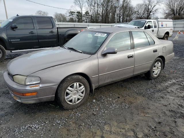 TOYOTA CAMRY LE 1993 with VIN 4T1VK12E7PU093838 - Photo from auction