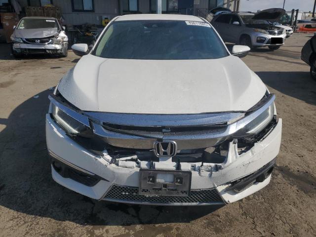 Photo 5 from auction – 2016 HONDA CIVIC LX with VIN 2HGFC2F65GH551735