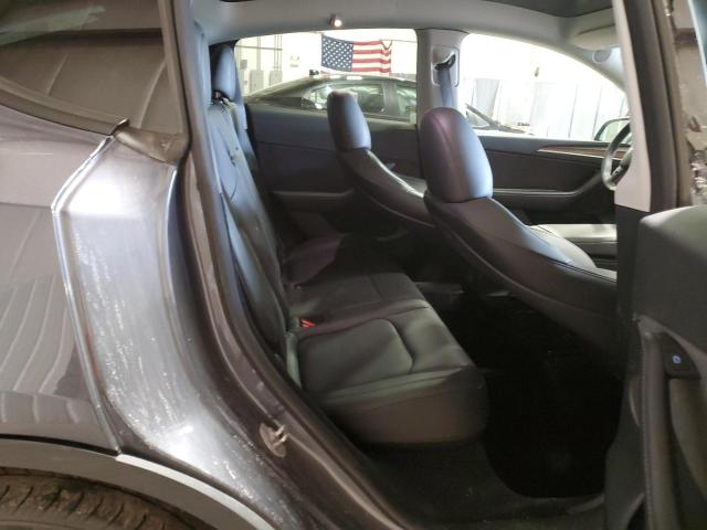 Photo 11 from auction – 2023 TESLA MODEL Y with VIN 7SAYGDEE2PF853282