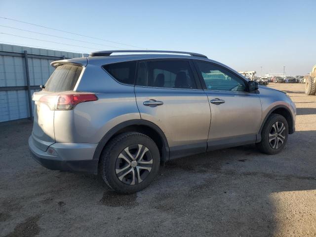 Photo 3 from auction – 2018 TOYOTA RAV4 LE with VIN 2T3ZFREV0JW439677