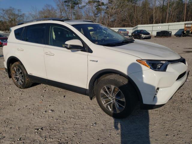 Photo 4 from auction – 2018 TOYOTA RAV4 HV LE with VIN JTMRJREV3JD217601