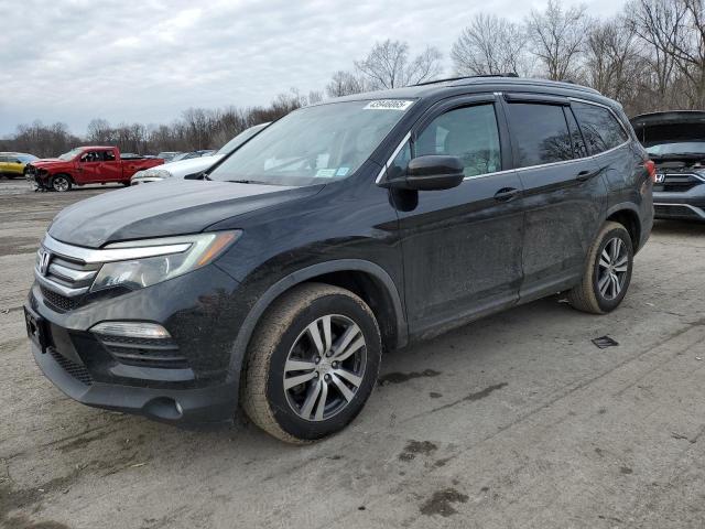 HONDA PILOT EX 2018 with VIN 5FNYF6H30JB073424 - Photo from auction