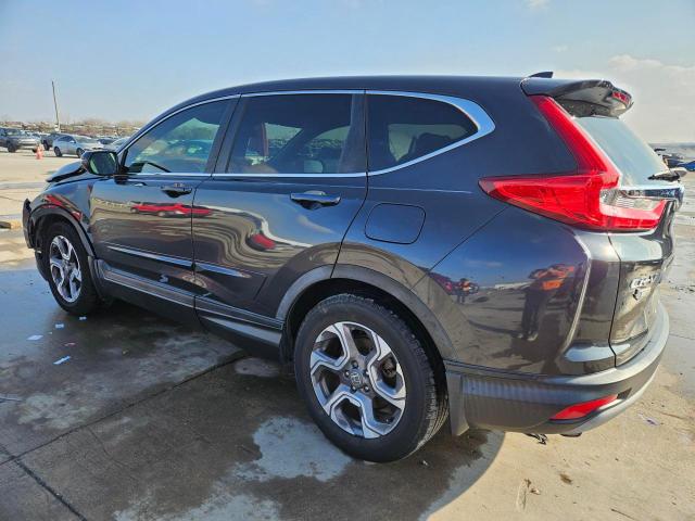 Photo 2 from auction – 2018 HONDA CR-V EX with VIN 7FARW1H54JE019296