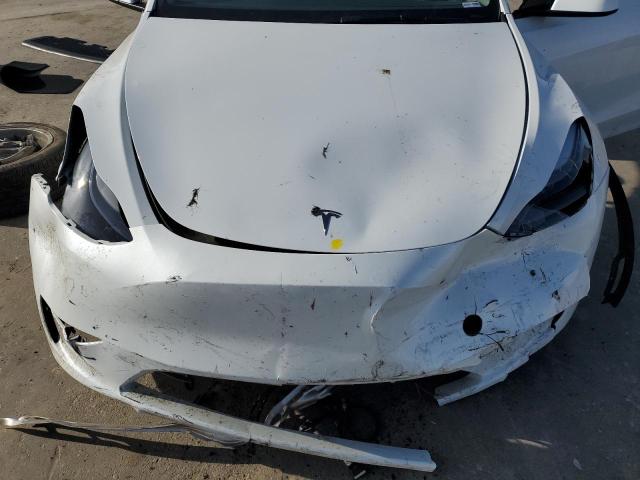 Снимка 12 от търг – 2024 TESLA MODEL Y с VIN 7SAYGDED4RF055859