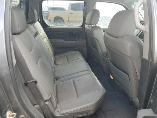 Photo 10 from auction – 2010 HONDA RIDGELINE with VIN 5FPYK1F58AB006922