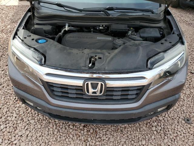 Photo 11 from auction – 2019 HONDA RIDGELINE with VIN 5FPYK2F50KB004377