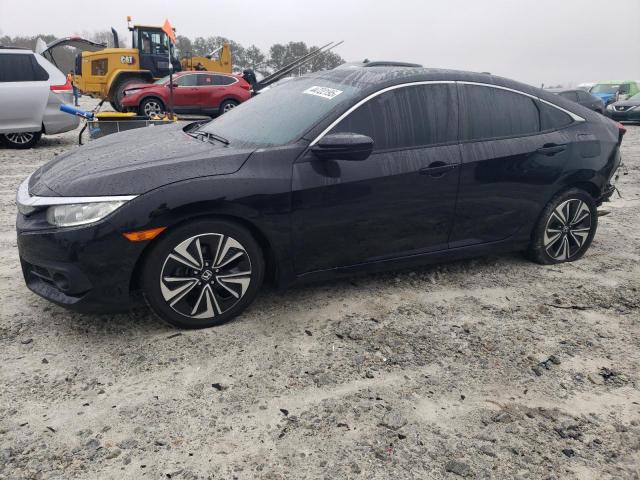 Photo 1 from auction – 2017 HONDA CIVIC EX with VIN 19XFC1F39HE003068