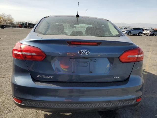 Photo 6 from auction – 2018 FORD FOCUS SEL with VIN 1FADP3H21JL327176