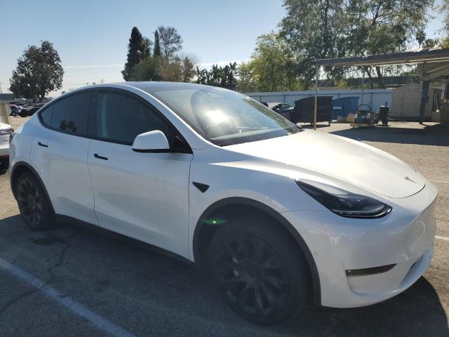 Photo 4 from auction – 2022 TESLA MODEL Y with VIN 7SAYGAEE6NF554003