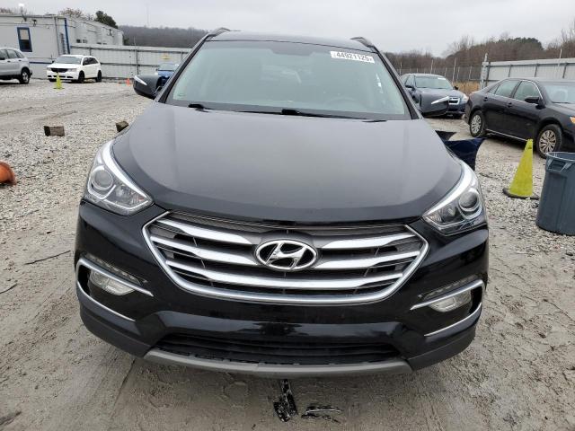 Photo 5 from auction – 2018 HYUNDAI SANTA FE S with VIN 5NMZU3LB8JH103825