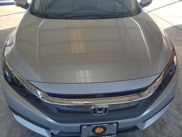 Photo 11 from auction – 2016 HONDA CIVIC EX with VIN 19XFC2F74GE032954