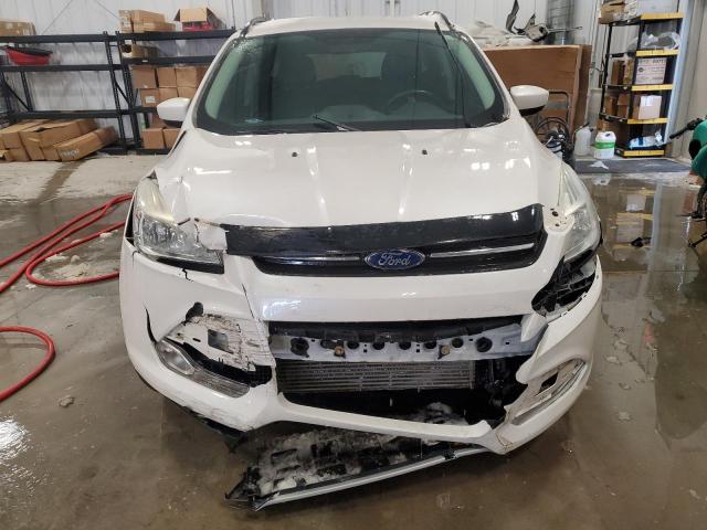 Photo 5 from auction – 2016 FORD ESCAPE SE with VIN 1FMCU9G98GUA57054