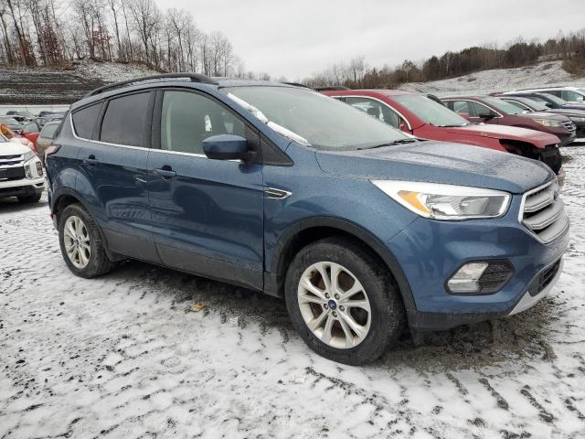 Photo 4 from auction – 2018 FORD ESCAPE SE with VIN 1FMCU9GD9JUC72843