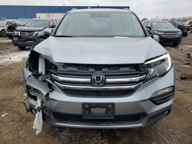 Photo 5 from auction – 2017 HONDA PILOT ELIT with VIN 5FNYF6H03HB010060
