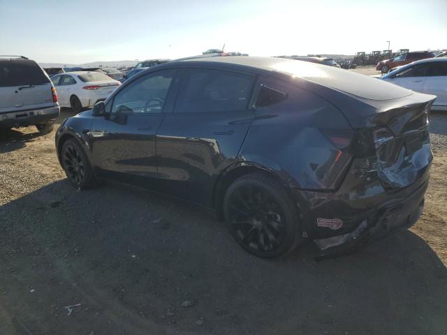 Снимка 2 от търг – 2024 TESLA MODEL Y с VIN 7SAYGAEE0RF023501