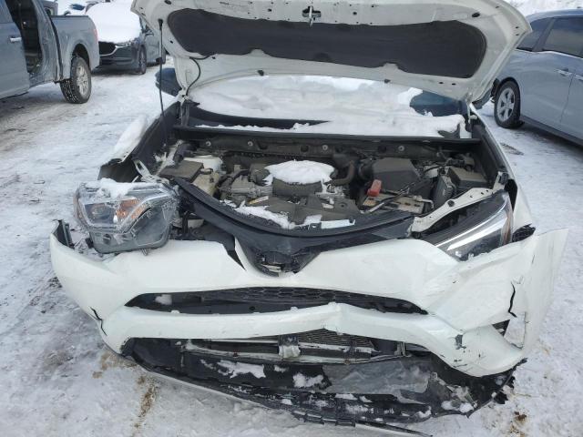 Photo 12 from auction – 2017 TOYOTA RAV4 SE with VIN JTMJFREV6HD206035