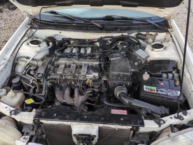 Photo 11 from auction – 1999 MAZDA 626 ES with VIN 1YVGF22C9X5887587