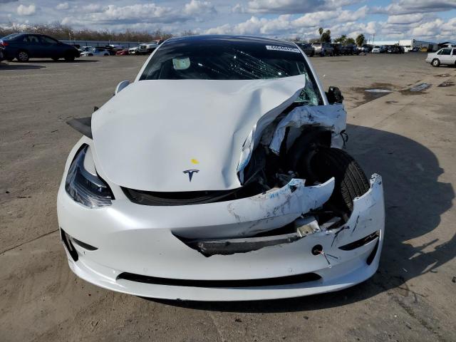 Photo 5 from auction – 2021 TESLA MODEL 3 with VIN 5YJ3E1EBXMF086987