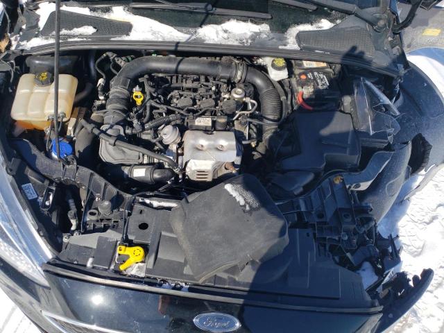 Photo 11 from auction – 2018 FORD FOCUS SE with VIN 1FADP3FE1JL310813