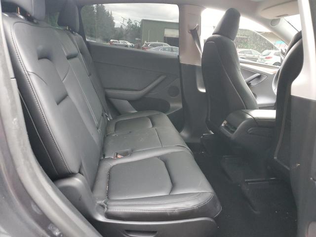 Photo 11 from auction – 2023 TESLA MODEL Y with VIN 7SAYGAEE3PF910443