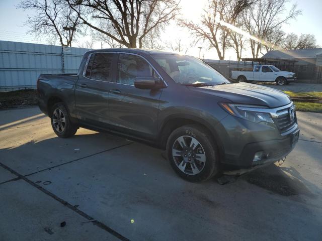 Photo 4 from auction – 2019 HONDA RIDGELINE with VIN 5FPYK2F56KB002827
