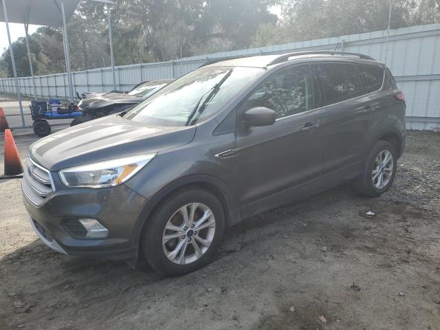 Photo 1 from auction – 2018 FORD ESCAPE SE with VIN 1FMCU0GDXJUB03944