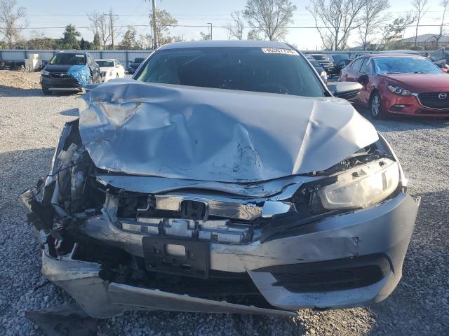 Photo 5 from auction – 2016 HONDA CIVIC LX with VIN 19XFC2F58GE068970