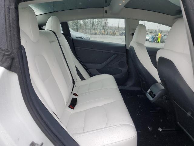 Снимка 10 от търг – 2023 TESLA MODEL 3 с VIN 5YJ3E1EA3PF542579