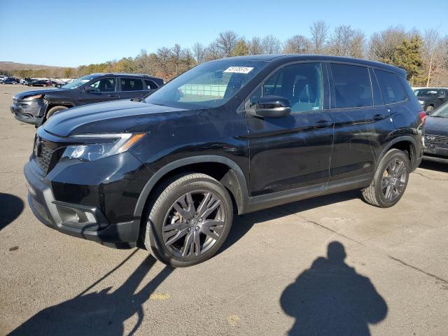 HONDA PASSPORT E 2021 with VIN 5FNYF8H54MB038483 - Photo from auction