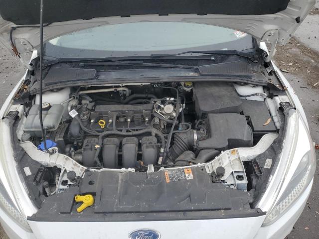 Снимка 11 от търг – 2016 FORD FOCUS SE с VIN 1FADP3K28GL376246