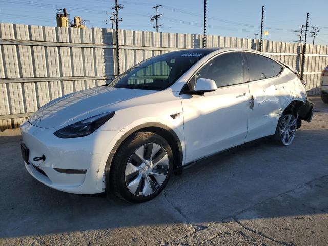 TESLA MODEL Y 2023 with VIN 7SAYGAEE7PF796074 - Photo from auction