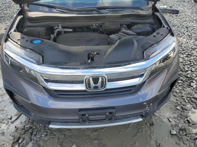 Photo 12 from auction – 2021 HONDA PILOT EXL with VIN 5FNYF6H54MB022899