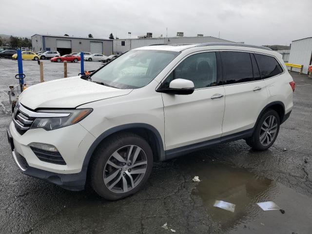 HONDA PILOT ELIT 2016 with VIN 5FNYF6H02GB112870 - Photo from auction