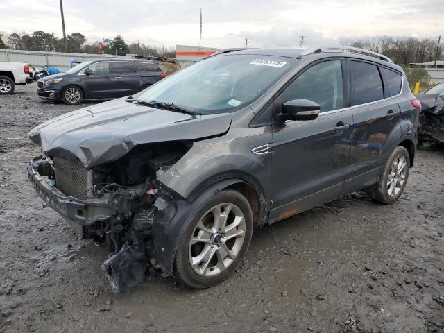 FORD ESCAPE TIT 2016 with VIN 1FMCU0JX6GUC40102 - Photo from auction