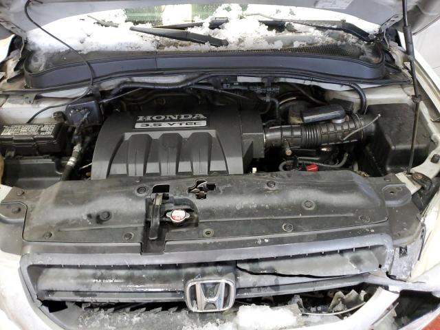 Photo 12 from auction – 2005 HONDA PILOT EXL with VIN 5FNYF18585B009707